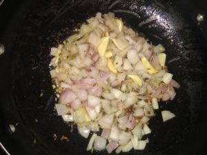 Karuvepilai kuzhambu-onion