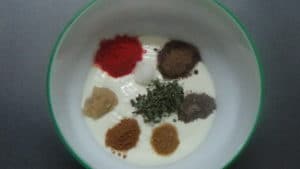 Paneer tikka - spice powders in curd