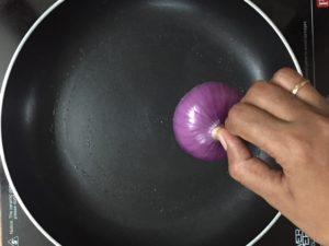 Rava uttapam -onion slices