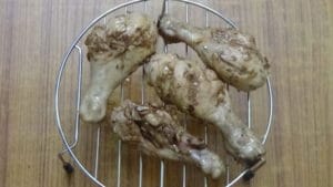 Garlic chicken roast -chicken on grill stand