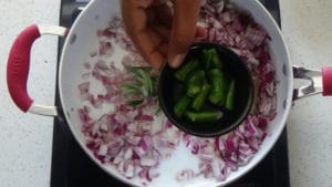 Milagu kozhi pirattal -green chillies